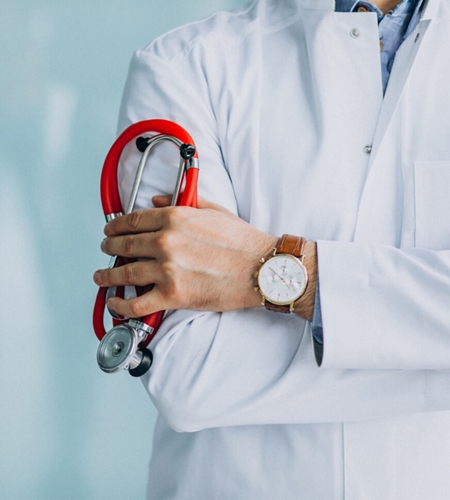 Doctor holding red stethoscope in close up shot